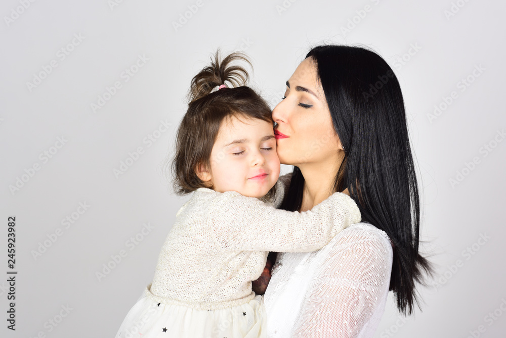 Beauty and fashion. Mother and daughter. Mothers day. Childrens day. Love and family. Happy woman with little girl. Pure beauty. Treasure in her hands. You are my little bird Beauty and fashion. Mother and daughter. Mothers day. Childrens day. Love and family. Happy woman with little girl. Pure beauty. Treasure in her hands. You are my little bird
