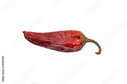 dry red peppers on a white background