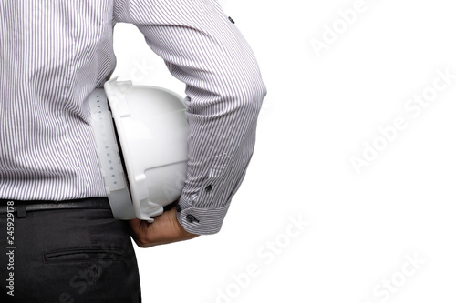 Crop image of engineer, worker or architect holding in hand white plastic helmet. Clipping path.