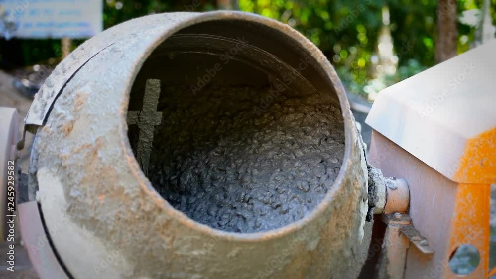 Concrete Mixer Mixing Mortar on Construction Sites and Kneading Concrete with Slow Motion. Concrete Mixer Mixing Mortar on Construction Sites and Kneading Concrete with Slow Motion.