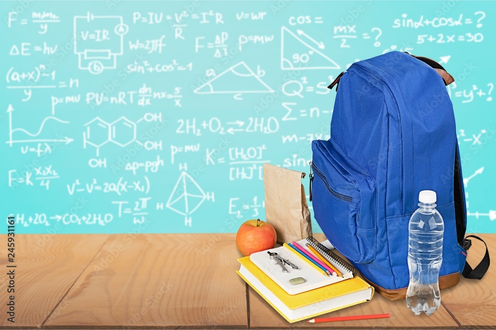 School Backpack with stationery on background School Backpack with stationery on background