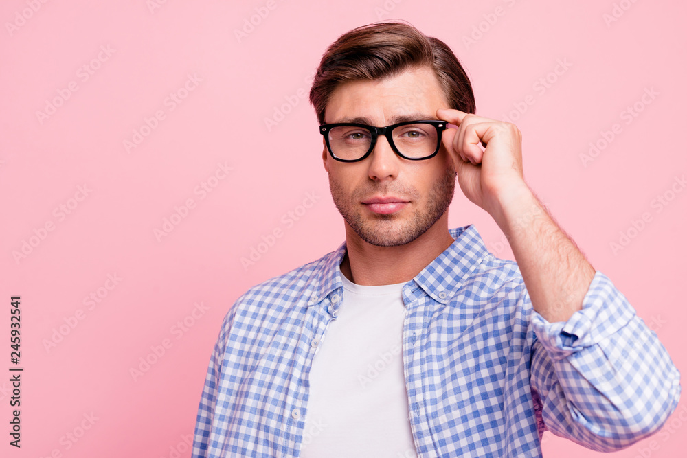 Close up photo of beautiful amazing brunet he him his handsome diligent student self-confidently looking arm on specs wearing casual checkered plaid shirt outfit isolated on rose background Close up photo of beautiful amazing brunet he him his handsome diligent student self-confidently looking arm on specs wearing casual checkered plaid shirt outfit isolated on rose background