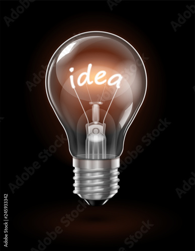 Transparent glowing  light bulb on a dark background with the word IDEA instead of a tungsten filament. Highly realistic illustration.
