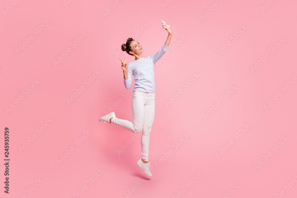 Fototapeta premium Full length body size view of nice cute winsome attractive lovely sweet cheerful cheery positive girl showing v-sign making selfie isolated over pastel pink background
