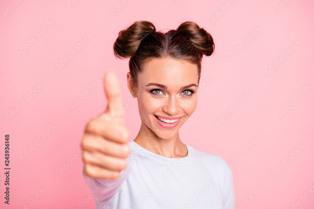 Close-up portrait of nice cute attractive winsome lovely sweet cheerful cheery positive content girl showing two double thumb-up isolated over pink pastel background Close-up portrait of nice cute attractive winsome lovely sweet cheerful cheery positive content girl showing two double thumb-up isolated over pink pastel background
