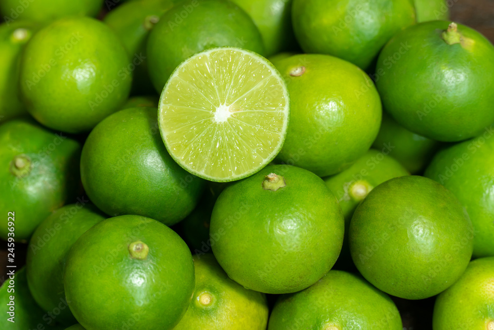 Green fresh green limes background Green fresh green limes background
