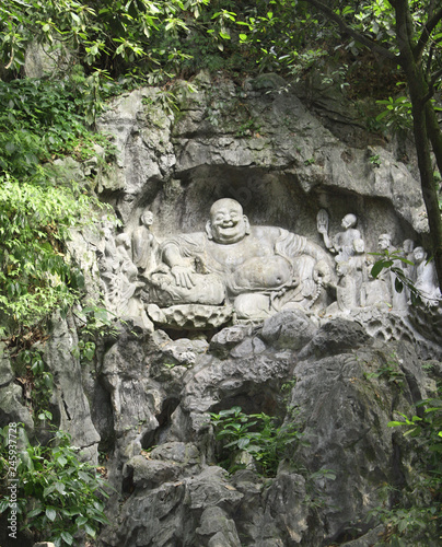 Ancient stone statue of Happy Buddha  Xian  Shaanxi province  China