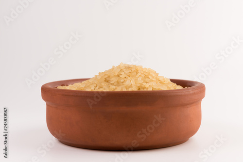white rice in bowl isolated on white background