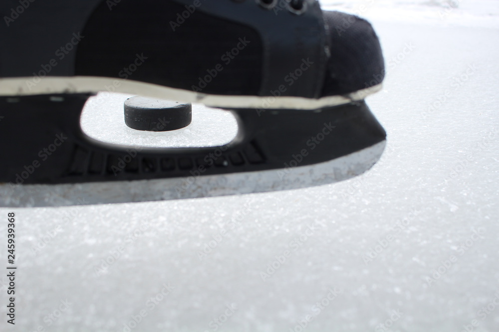 Fotografie Puck, Schlittschuh, Schläger