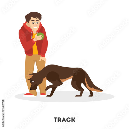 Man training his pet dog. Track command