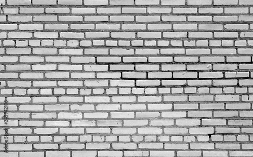 Old brick wall surface in black and white.