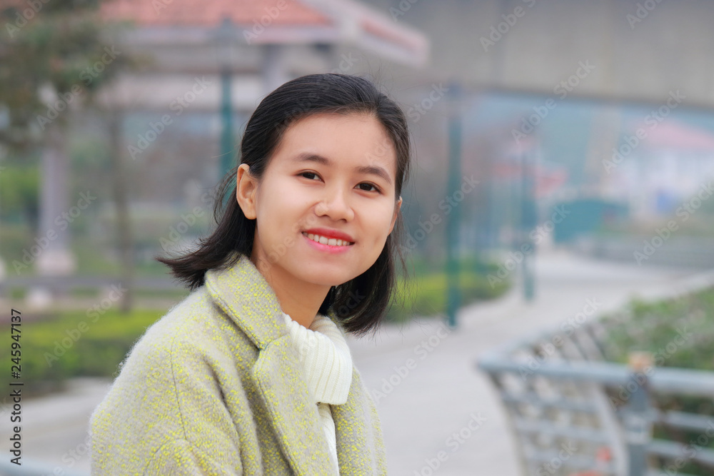 woman traveling in Vietnam in winter woman traveling in Vietnam in winter