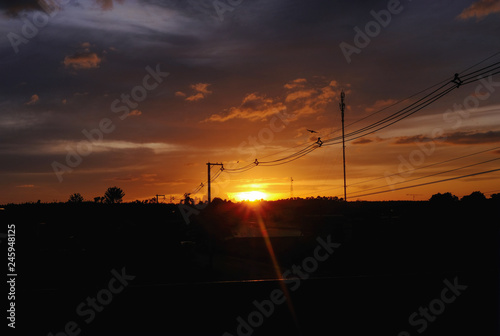 Beautiful sunset scene above small country