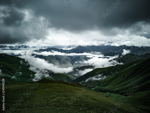 Above clouds in mountains 