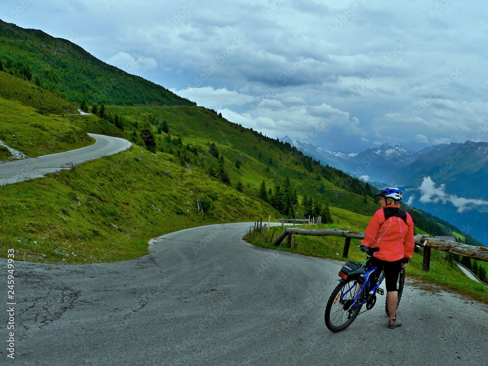 Austrian Alps-view of the cyclist on the mountain road