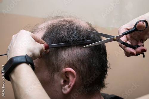 haircut male head with scissors