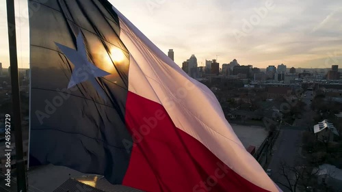 4K Texas Flag Slide Aerial - Downtown Austin
