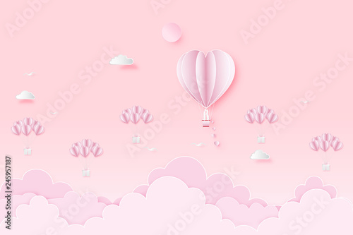 Paper art , cut and digital craft style of the lover in hot air heart balloon on pink sky and full moon as love, happy valentine's day and wedding concept. vector illustration.