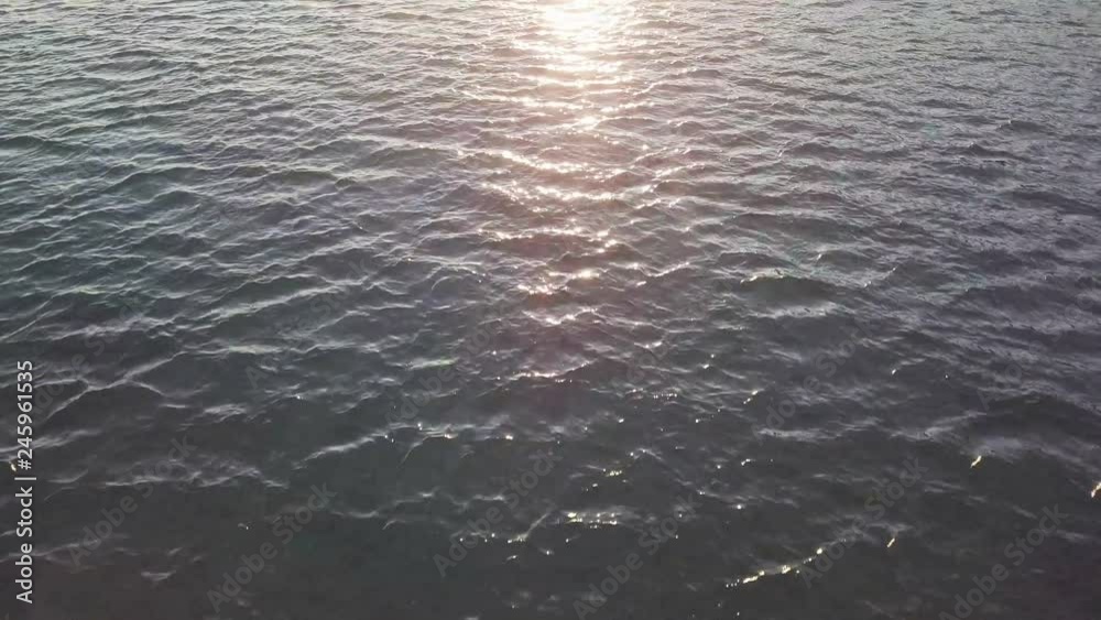 Stunning sunset on the ocean. Beautiful aerial view.