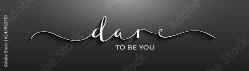 DARE TO BE YOU brush calligraphy banner on black background