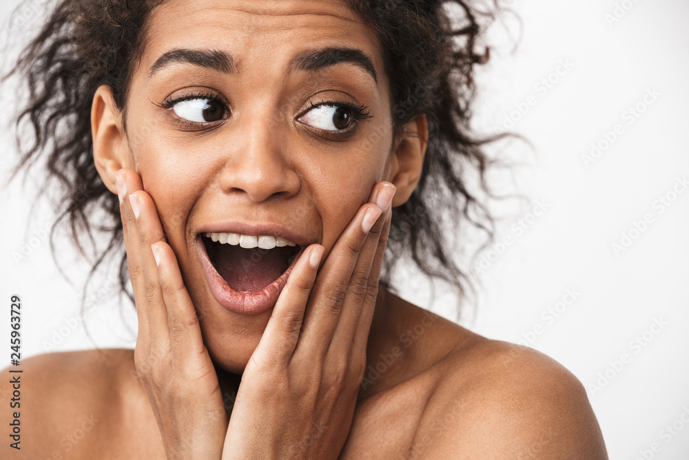 Close up of a beautiful shocked young topless african woman Close up of a beautiful shocked young topless african woman
