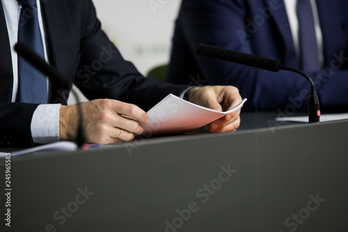 Business people writing notes
