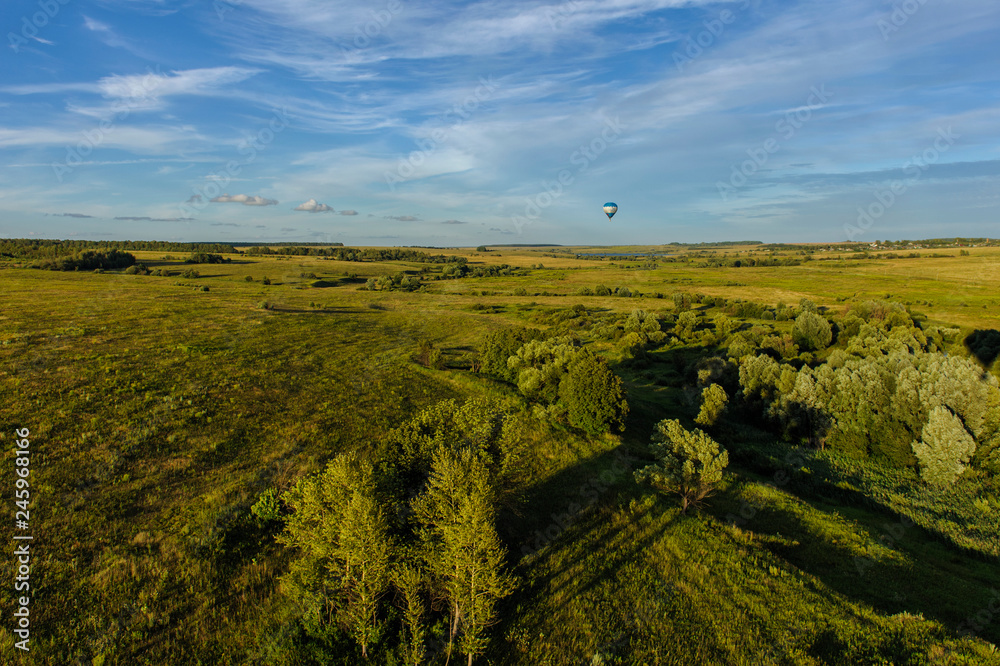 Obraz premium Many colorfull balloons in the sky at blue sky with clouds background 