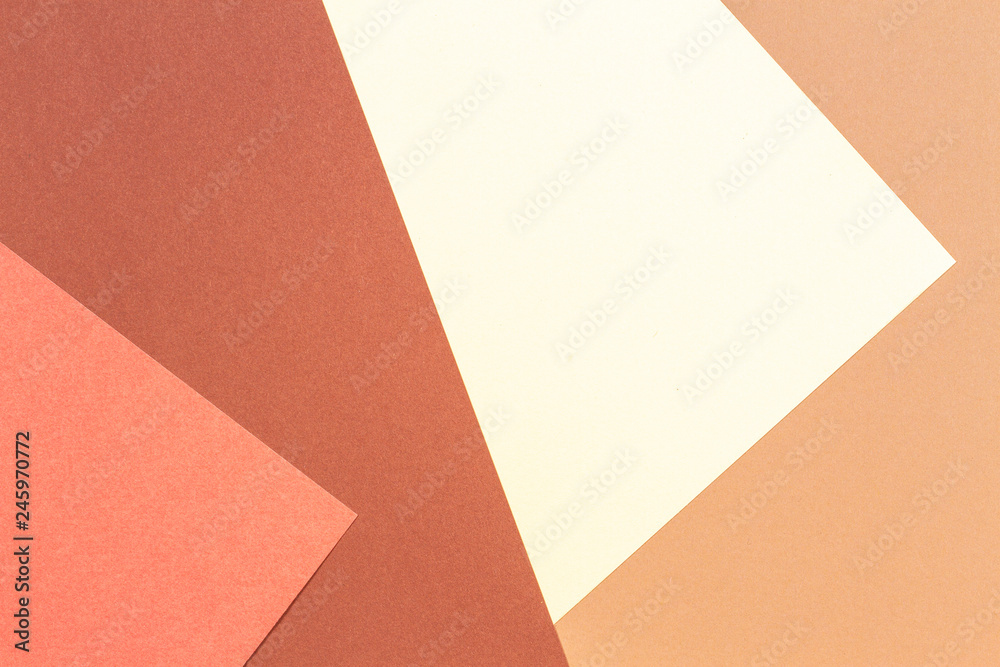 Abstract geometric paper texture cardboard background. Brown, beige, coral, yellow pastel trendy colors Abstract geometric paper texture cardboard background. Brown, beige, coral, yellow pastel trendy colors
