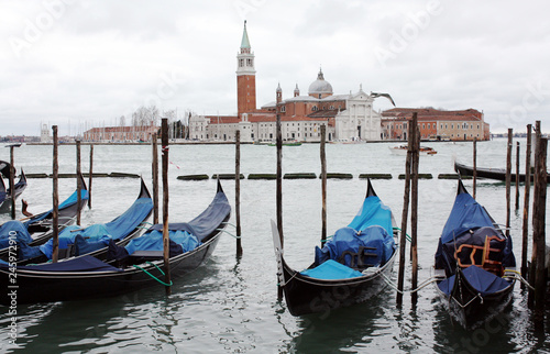 Gondolas in Venice Italy Adriatic sea. Markusdom. St Mark's Basilica Square. Saint Marco Square.  © Malira