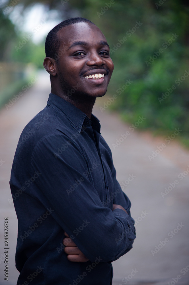Portrait of a handsome African man smiling. Portrait of a handsome African man smiling.