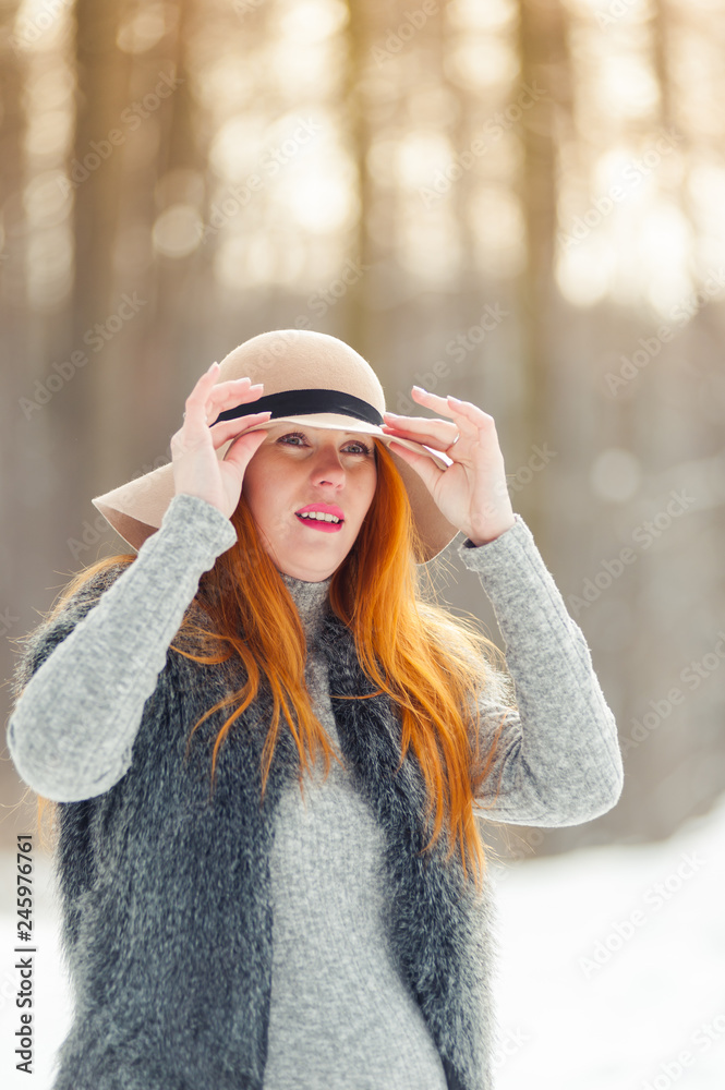 Portrait of red hat pregnant woman in snowy forest Portrait of red hat pregnant woman in snowy forest