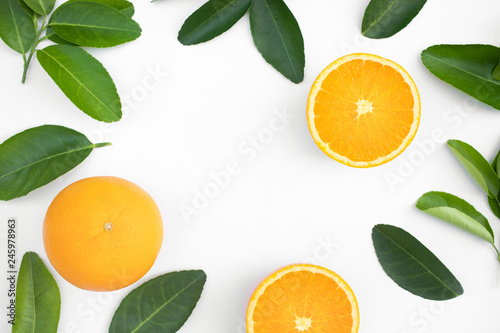Top view of orange fruit and leaves on table background.concepts ideas of fruit,vegetable.healthy eating