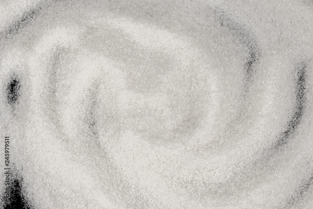 Scattered sugar on a black background Scattered sugar on a black background