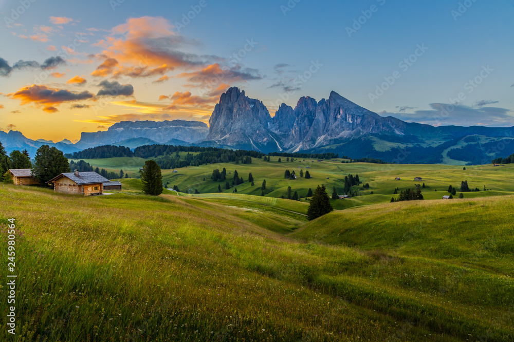 Beautiful sunrise at Alpe di siusi (Seiser Alm) with langkofel mountain in Dolomites, Italy