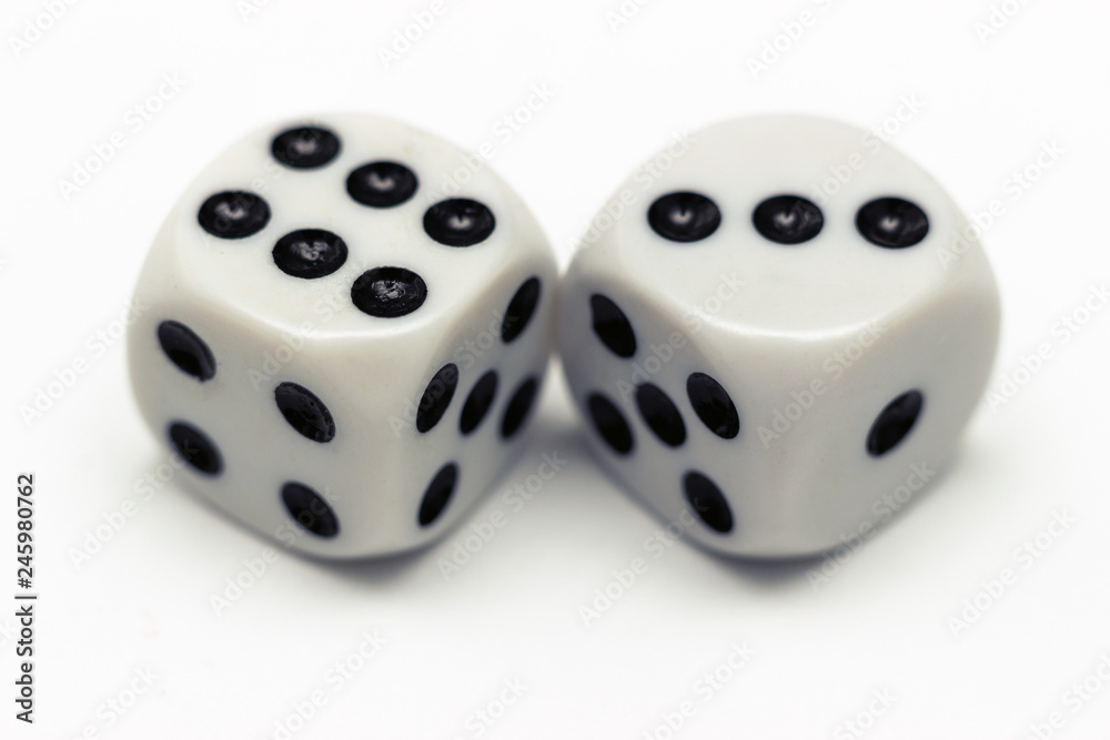 Black and white dices against a white background Black and white dices against a white background