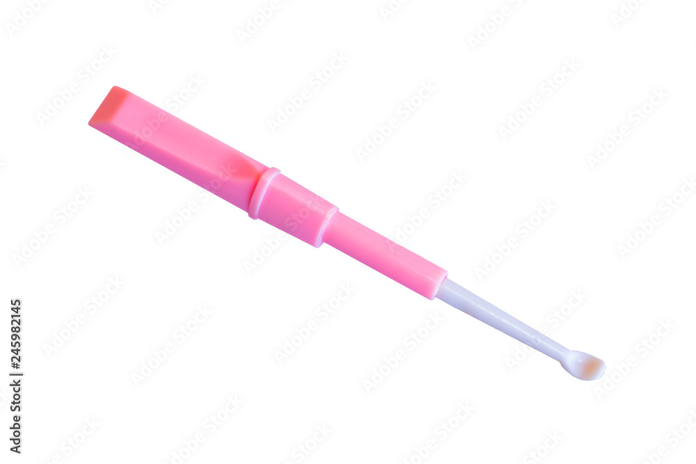 Isolated pink ear pick on white background Isolated pink ear pick on white background