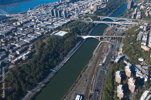 Bridges between Manhattan and the Bronx in New York NYC in USA. Upper Manhattan. Harlem river. Aerial helicopter view