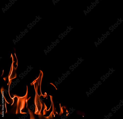 Flames of fire on a black background. Space for copy  text  your words