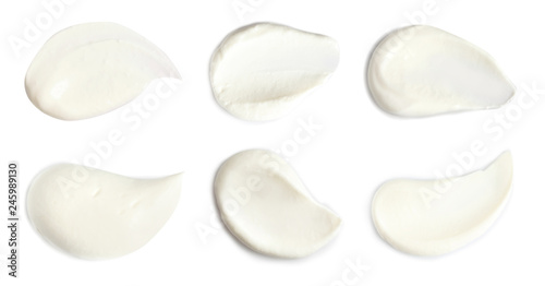Photos Set of delicious sour cream on white background, top view