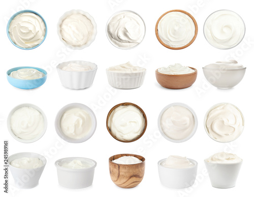 Set of delicious sour cream in bowls on white background