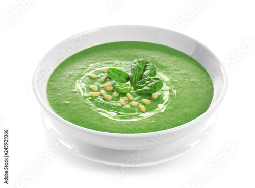 Dish with spinach cream soup on white background. Healthy food
