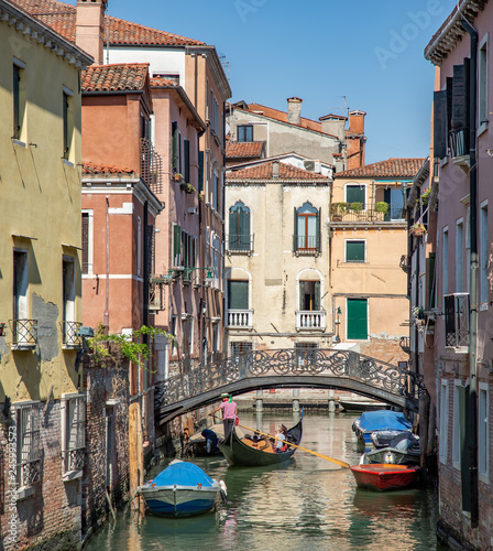 Italy beauty, boats on typical canal street in Venice , Venezia