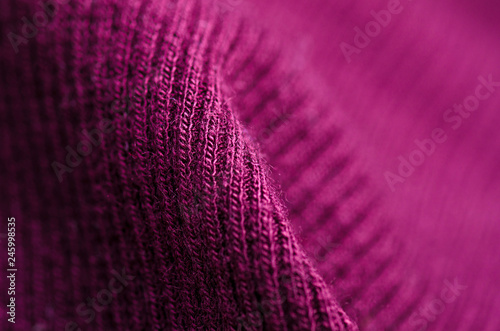 Fabric warm purple pink lilac sweater textile material texture blur background macro