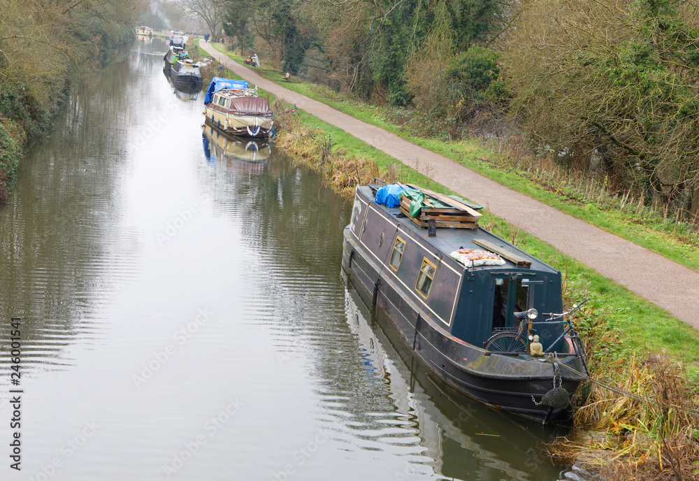 Many Narrow boats in the Kennet and Avon canal  in the city Bath in England