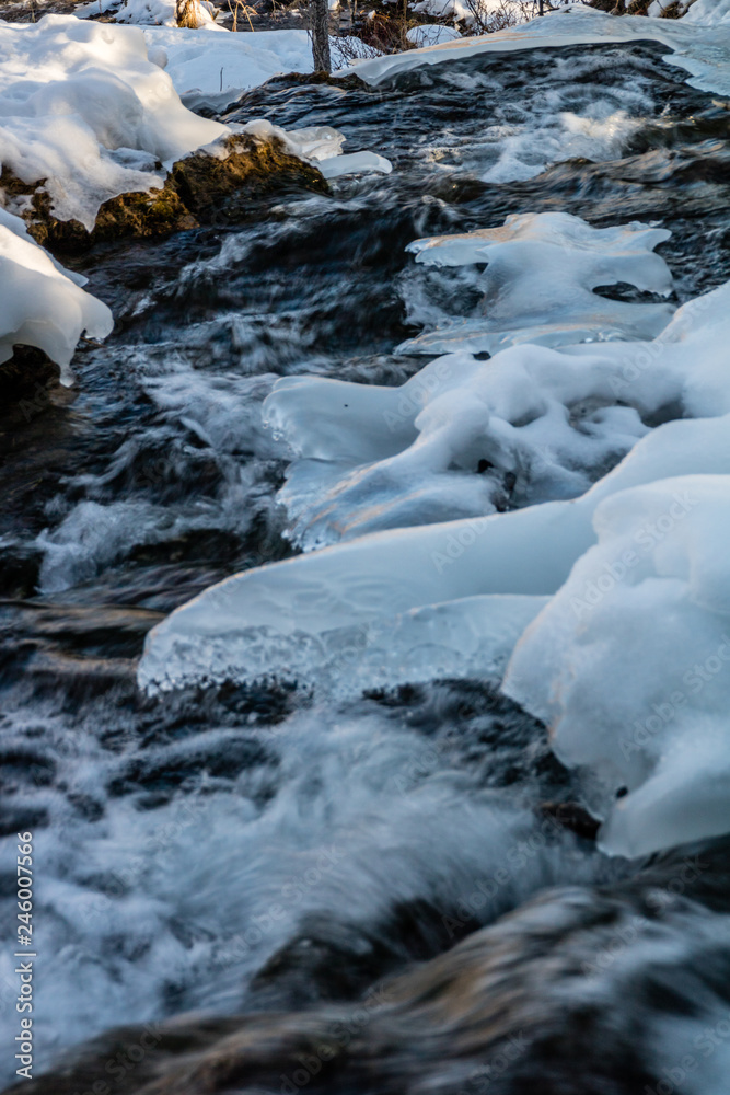 Big Hills springs under snow and ice, Big Hill Springs Provincial Recreation Area, Alberta, Canada