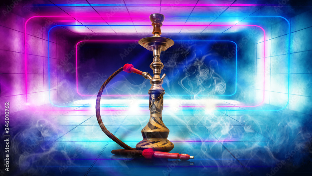 Hookah smoking on the background of an empty room with blue and pink neon shapes. Concrete floor, tile, smoke Hookah smoking on the background of an empty room with blue and pink neon shapes. Concrete floor, tile, smoke