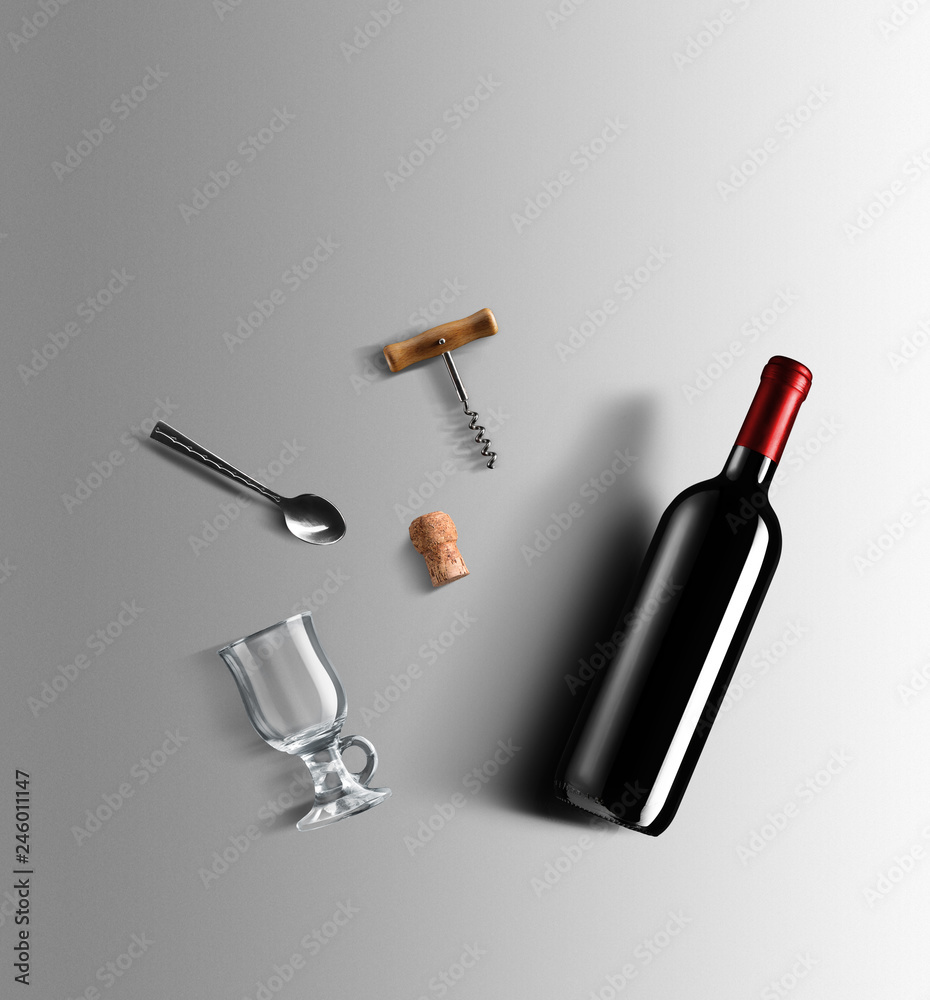 Naklejka premium Mulled wine recipe ingredients and kitchen accessories, bottle of red wine, cinnamon, anise stars, orange, brown sugarand spice on gray background.