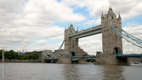 Tower Bridge and the River Thames, London. A view north of the iconic London landmark spanning the River Thames towards The Tower of London on the far bank.