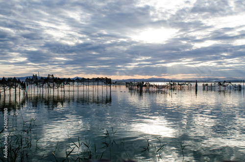 Sunset on one day cloudy in the famous lake of the albufera of Valencia, Spain