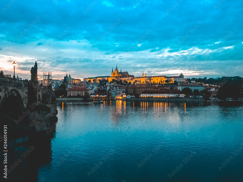 Naklejka premium prague in the afternoon with cloudy background, Moldavia river and castle